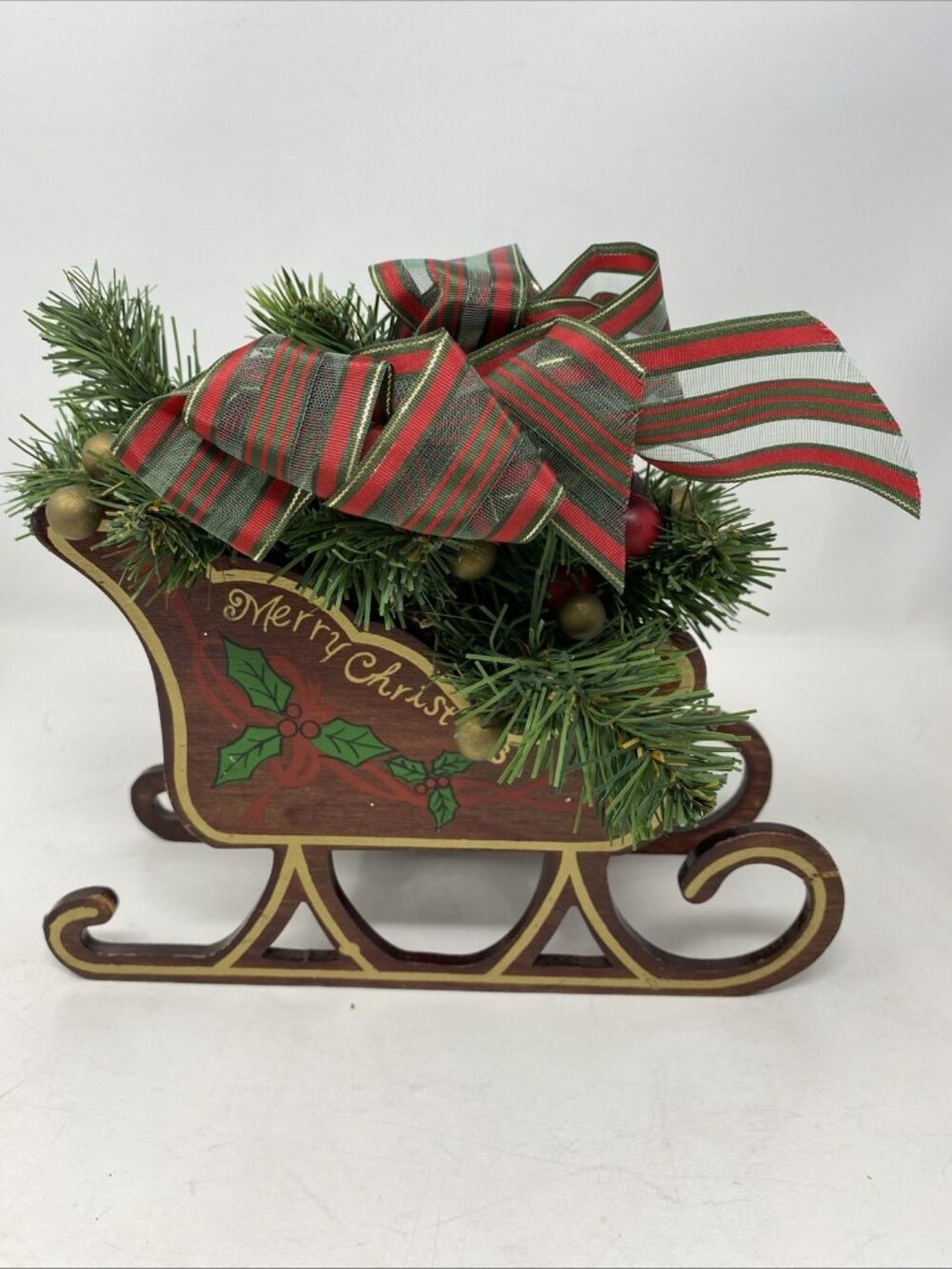 Wooden Merry Christmas Sleigh With Green Pine And Red Berries Plaid Ribbon 8”